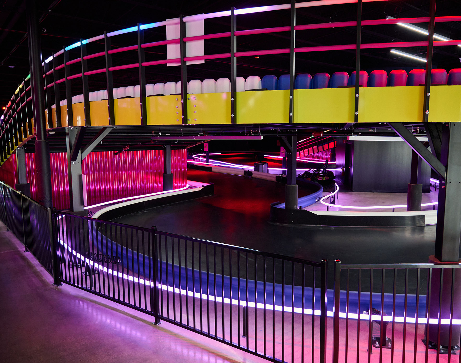 Functional space created beneath an elevated karting track ramp